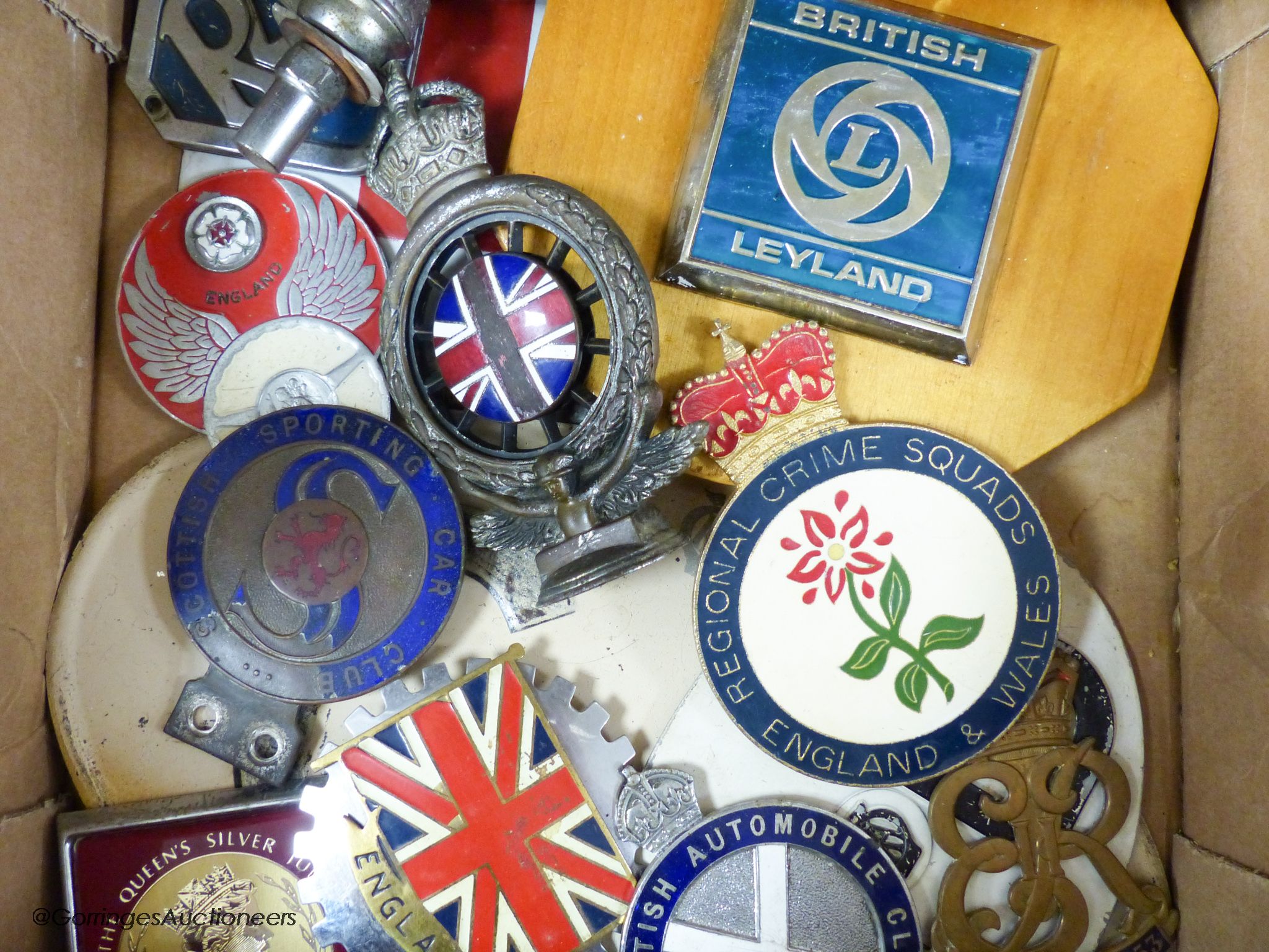 A quantity of various British Car badges